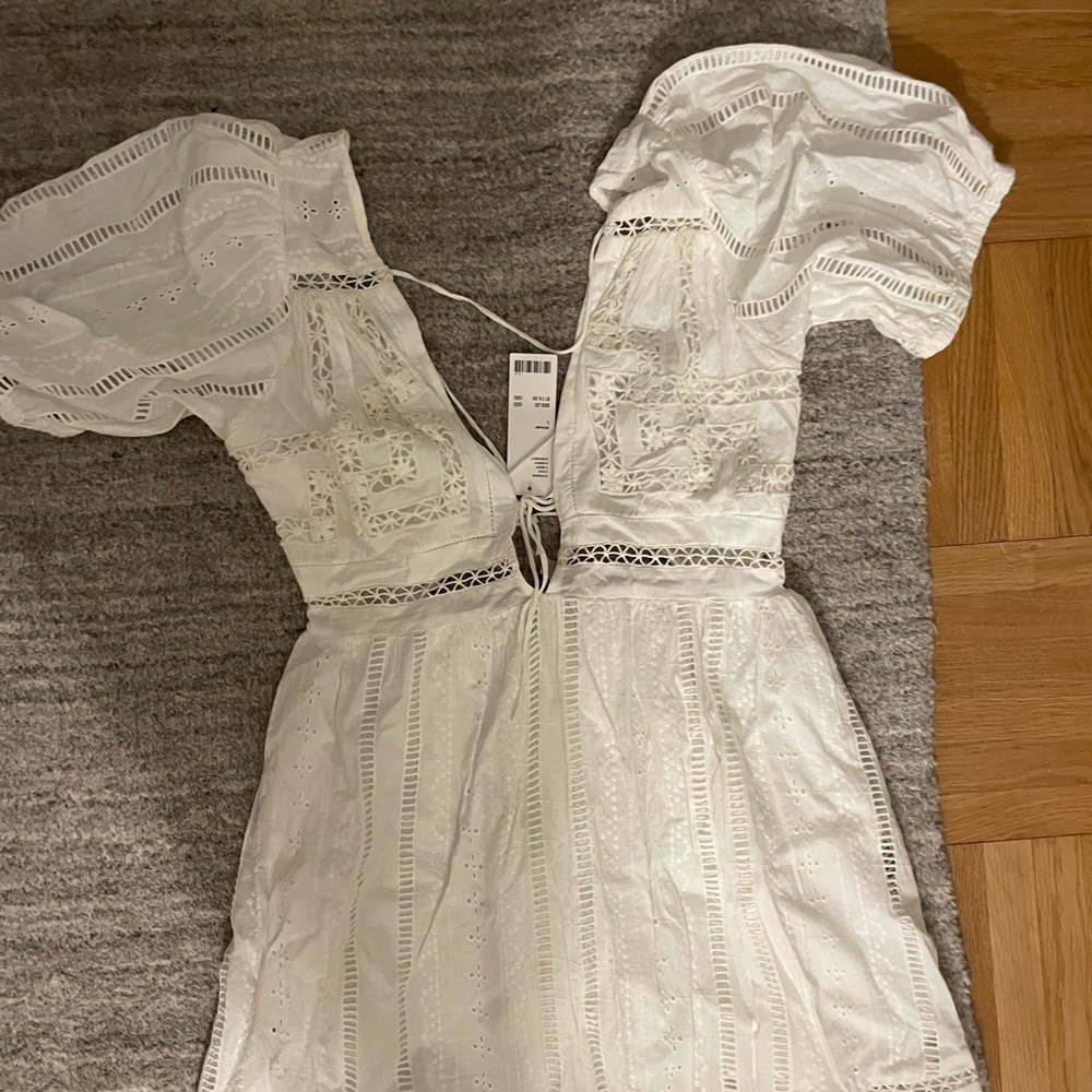 Beautiful white urban outfitters dress! Perfect for summer and vacations. NBW